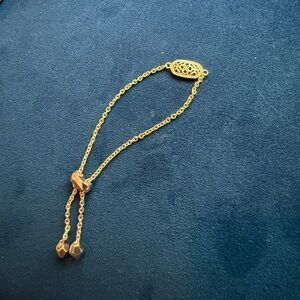 gold kendra scott bracelet